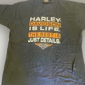 Harley-Davidson Black T‑Shirt with Orange & White Text Graphic